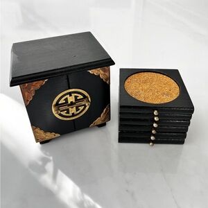 Vintage Asian style coasters set black lacquer box brass accents 1980s set of 6